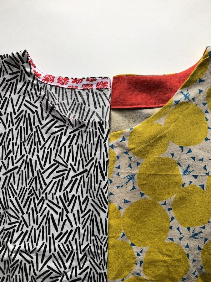 Two piece of fabric with collars that were sewn on.
