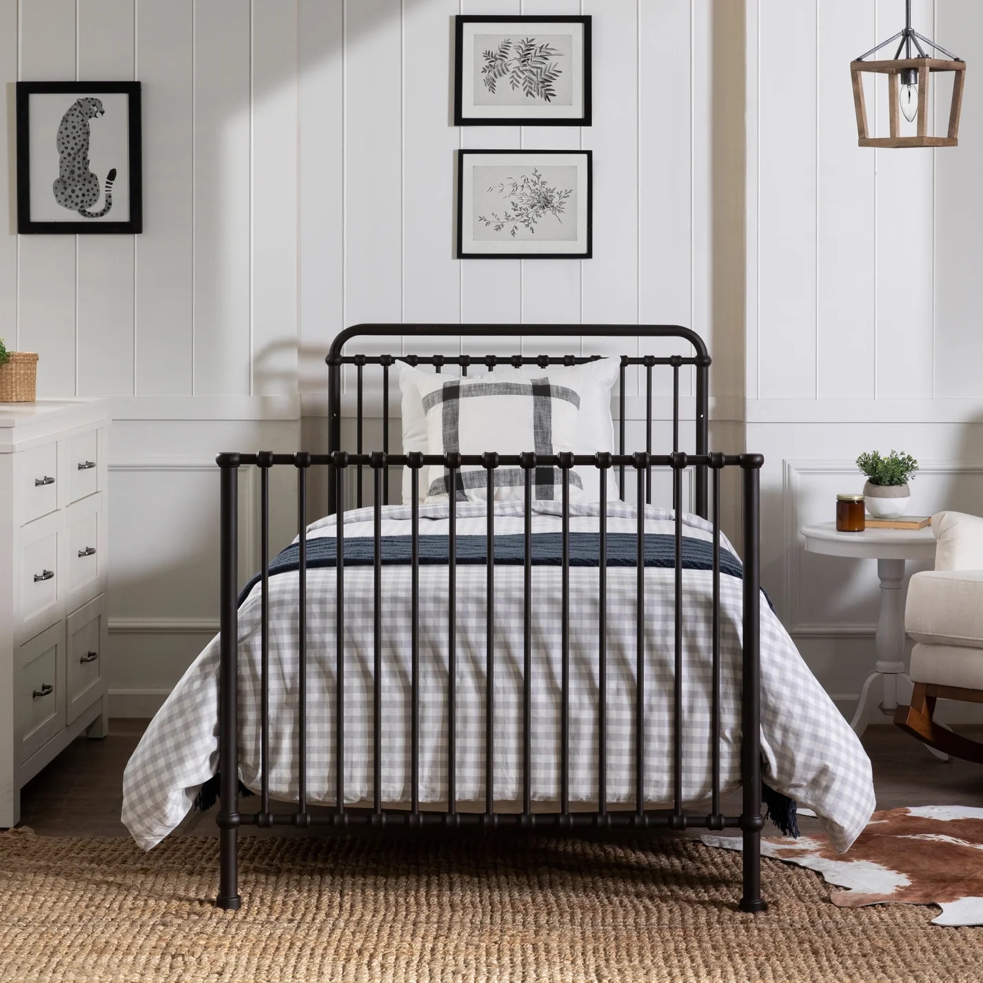 A converted black full sized bed.