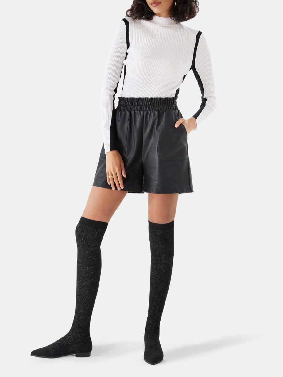 A model wearing sustainable boots from Vivaia