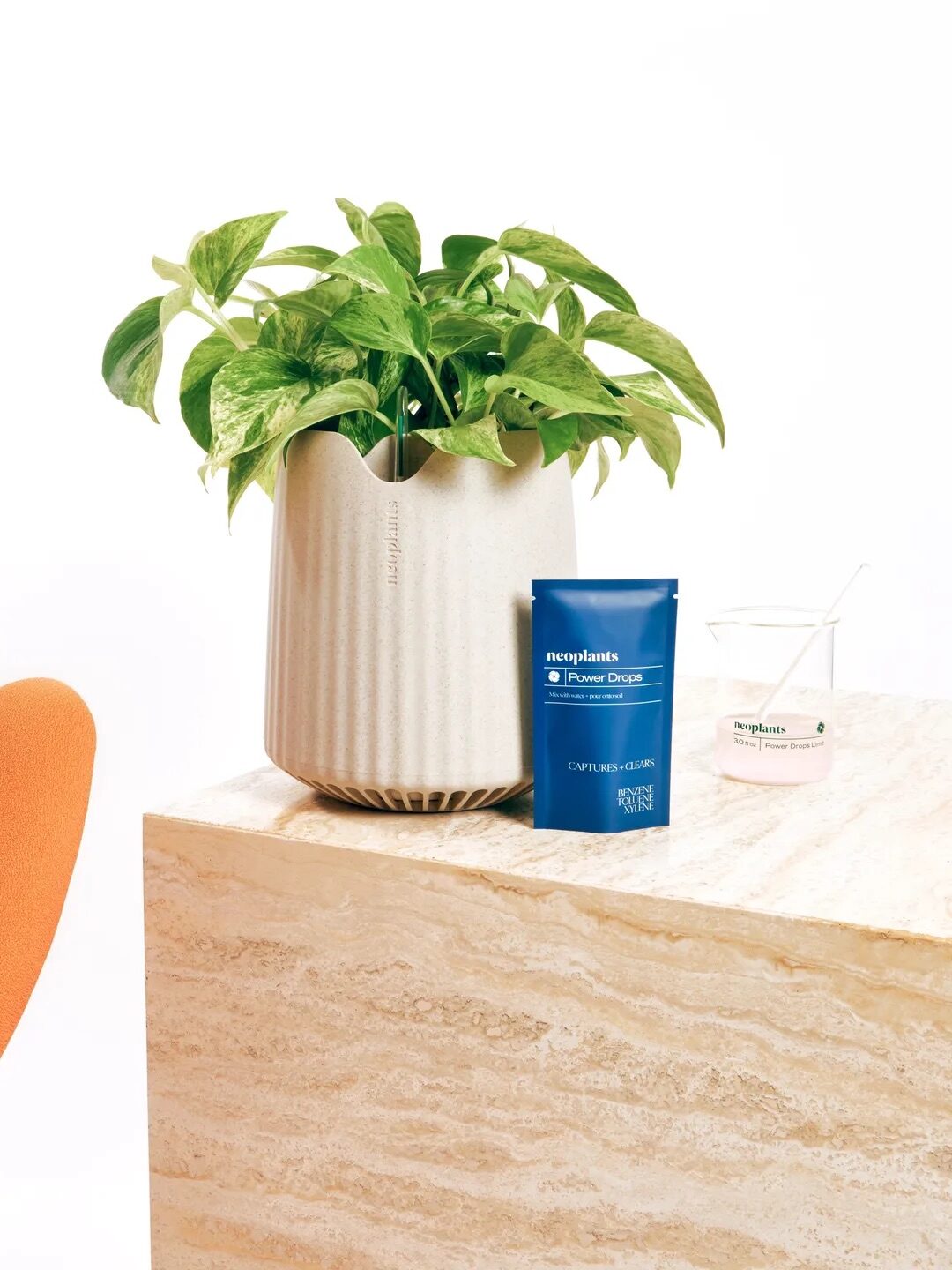Neoplants air purifying plant, with the power drops next to the plant.