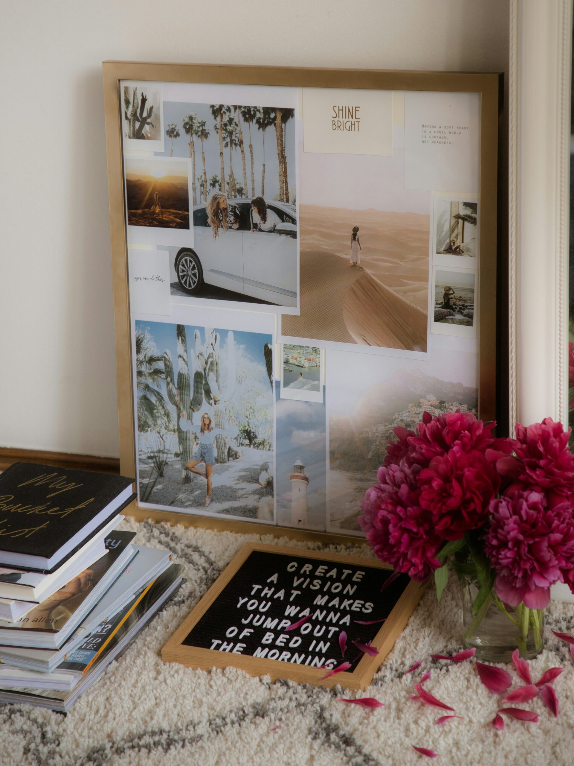 A vision board leaning against the floor.