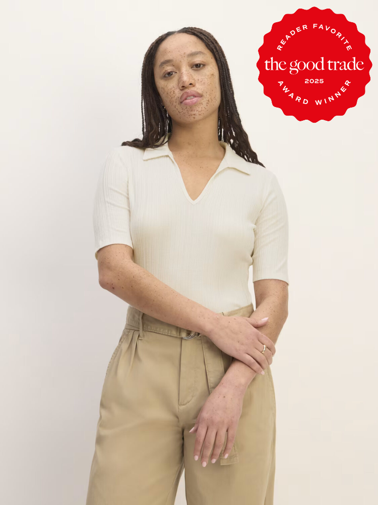 Person with long hair wearing a beige top and pants, standing against a plain background. A red badge in the corner reads "Reader Favorite: The Good Trade Award Winner 2025.