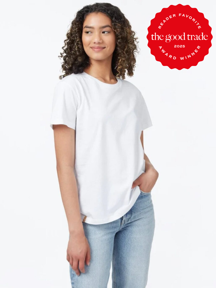 Person wearing a white T-shirt and jeans stands with one hand in a pocket. A red badge on the image reads, "Reader Favorite, the good trade, 2025 Award Winner.