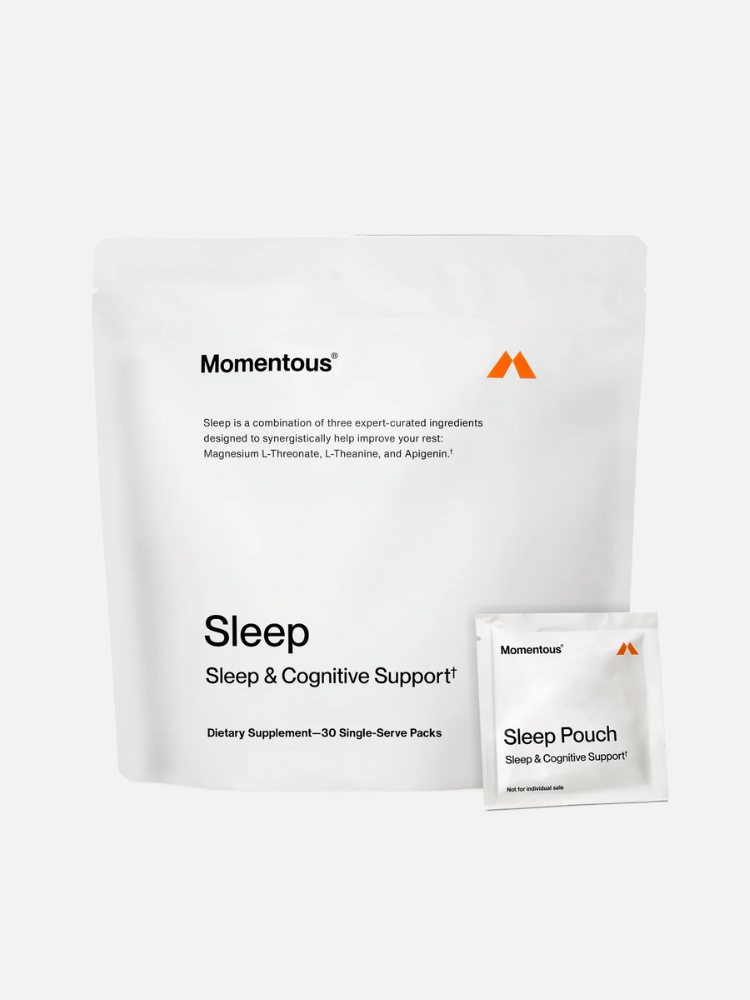 White packaging of Momentous Sleep & Cognitive Support supplements, featuring a large resealable bag and a smaller single-serve pouch.