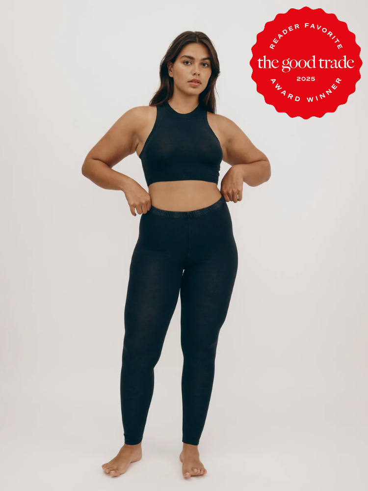 A woman in black activewear poses against a plain background. A red badge on the image reads "Reader Favorite, The Good Trade, 2025 Award Winner.