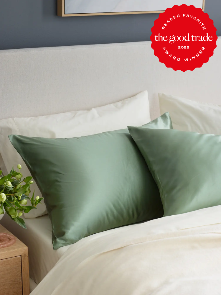 A bed with a white sheet and two green pillows. A red badge on the image reads: "Reader Favorite, the good trade, 2025, Award Winner.