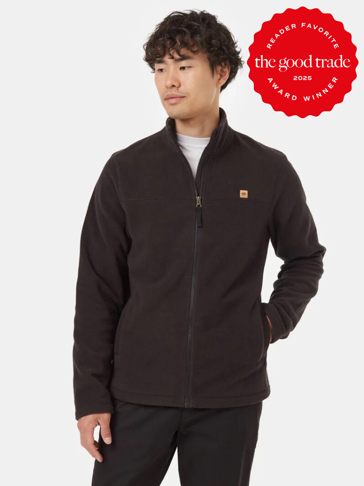 A man wearing a black fleece jacket stands against a plain background. A red badge in the top right corner says, "The Good Trade Reader Favorite Award Winner 2025.