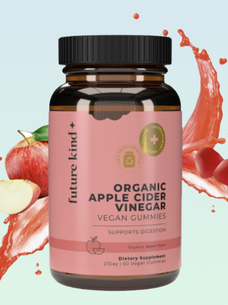 A bottle of Future Kind+ organic apple cider vinegar vegan gummies with apple slices and splash background.