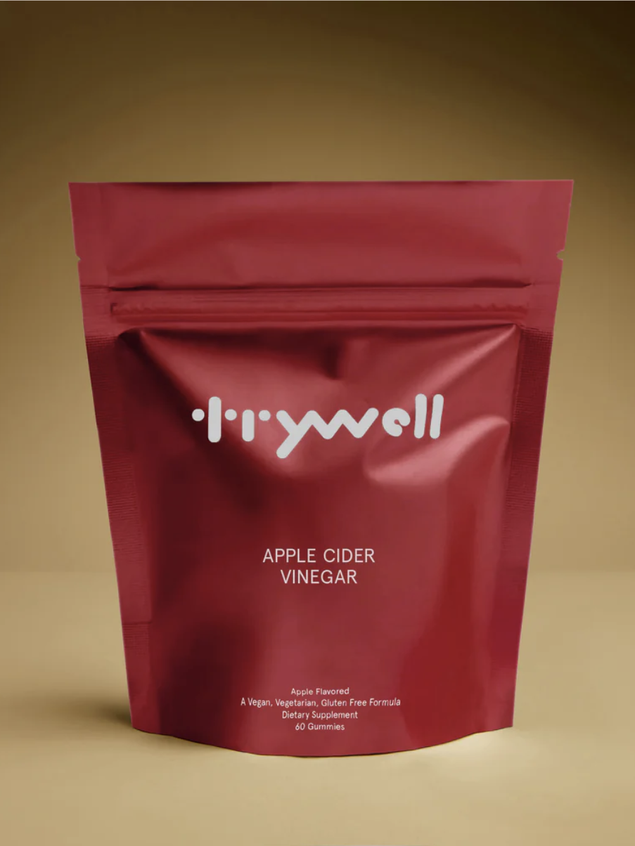 Red resealable pouch labeled "Trywell Apple Cider Vinegar," containing 60 gummies. Vegan, vegetarian, and gluten-free formula.