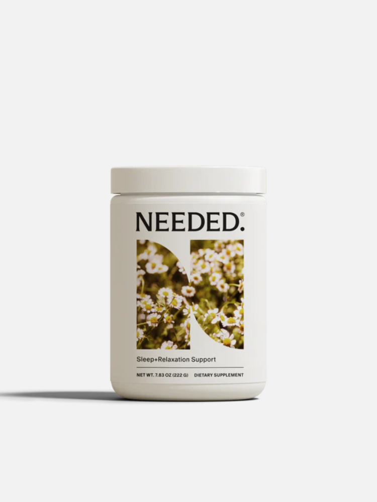 White jar labeled "NEEDED" with an image of flowers on the front, containing a sleep and relaxation support dietary supplement.