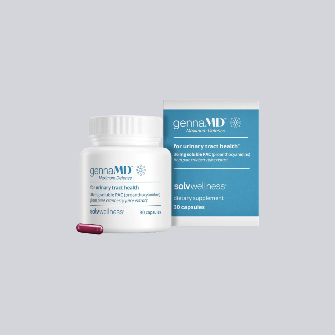 White bottle and box of gennaMD Maximum Defense dietary supplement for urinary tract health with one purple capsule beside the bottle, all on a light gray background.
