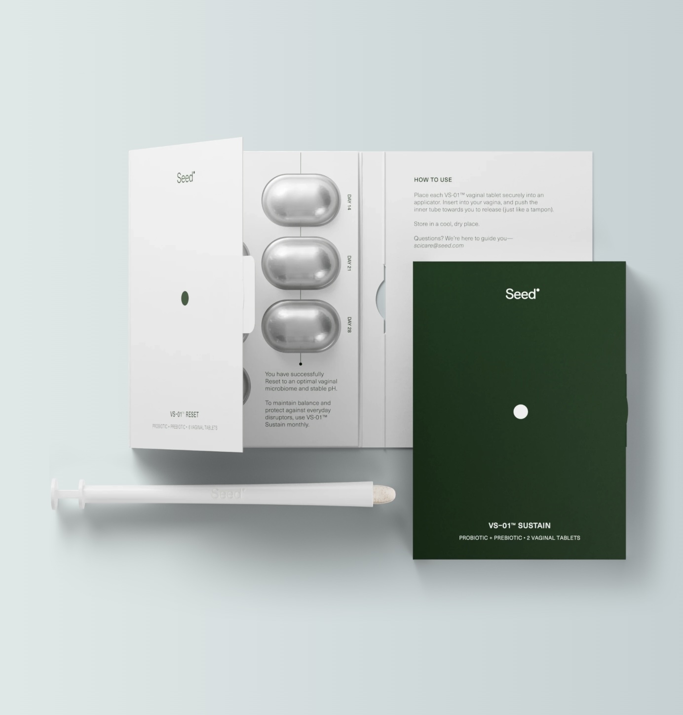 A green and white Seed VS-01™ SUSTAIN probiotic and prebiotic vaginal tablet kit, showing tablets in blister packaging, an applicator, and instructions.